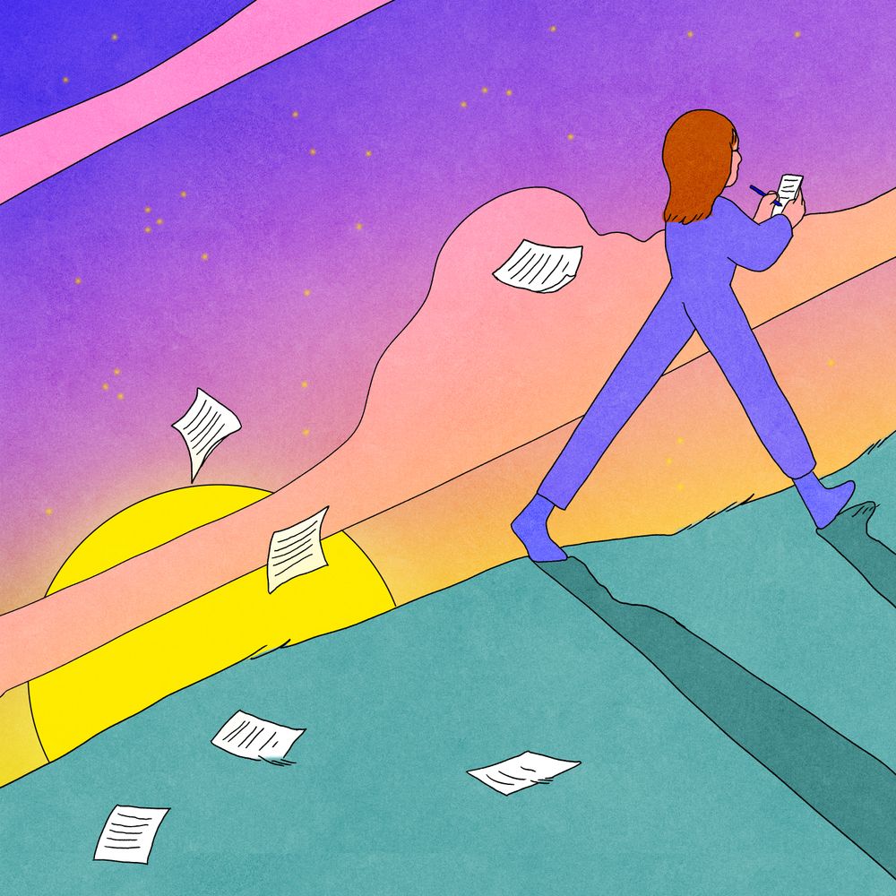 Person walking up a hill writing pages