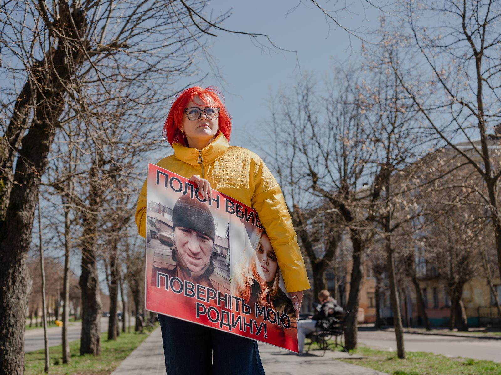 A person holding a sign.